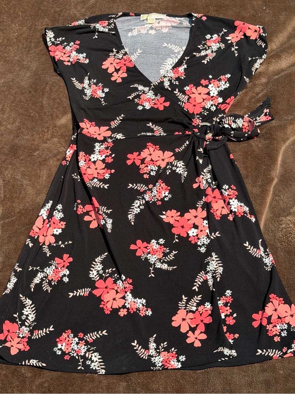 black and pink floral print faux-wrap dress by Michael Kors.